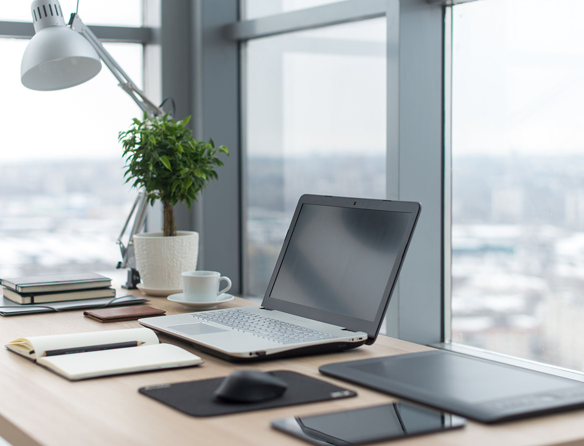 Photo of a corner office facing out a window